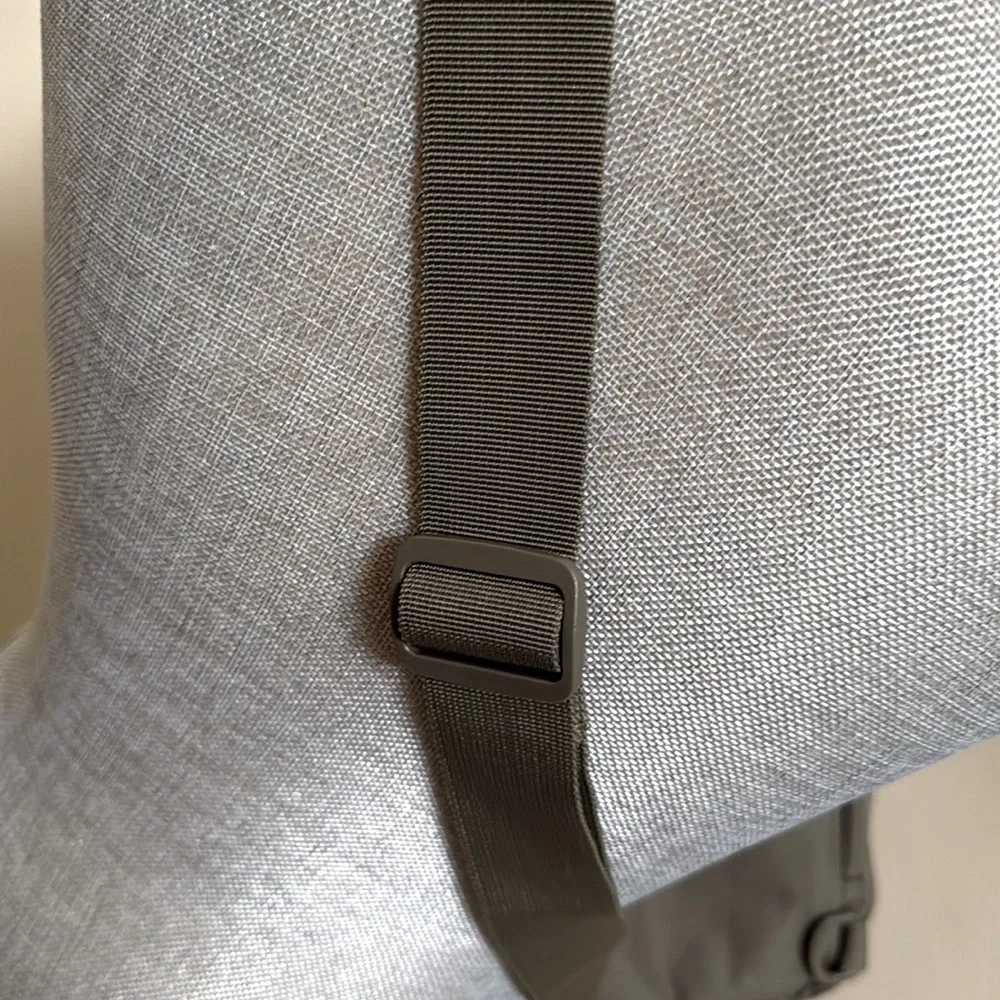 Tactical Sling Bag - Olive Green. Multiple pockets. Spacious compartments.